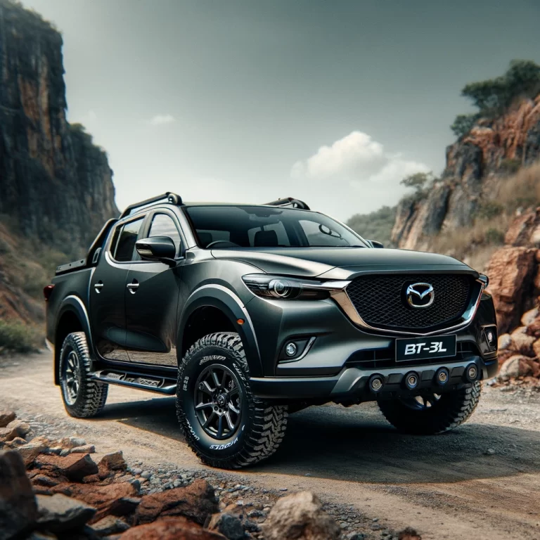 A Mazda BT-50 3L parked in a rugged terrain setting, showcasing its off-road capabilities and durable design.